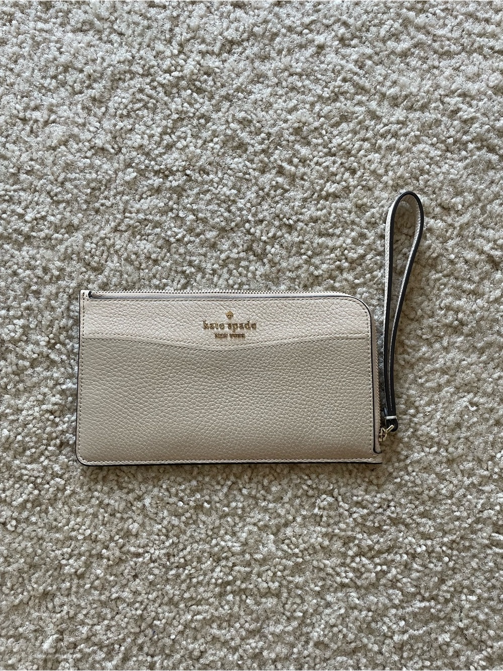 kate spade Cream Pebbled Leather Wristlet